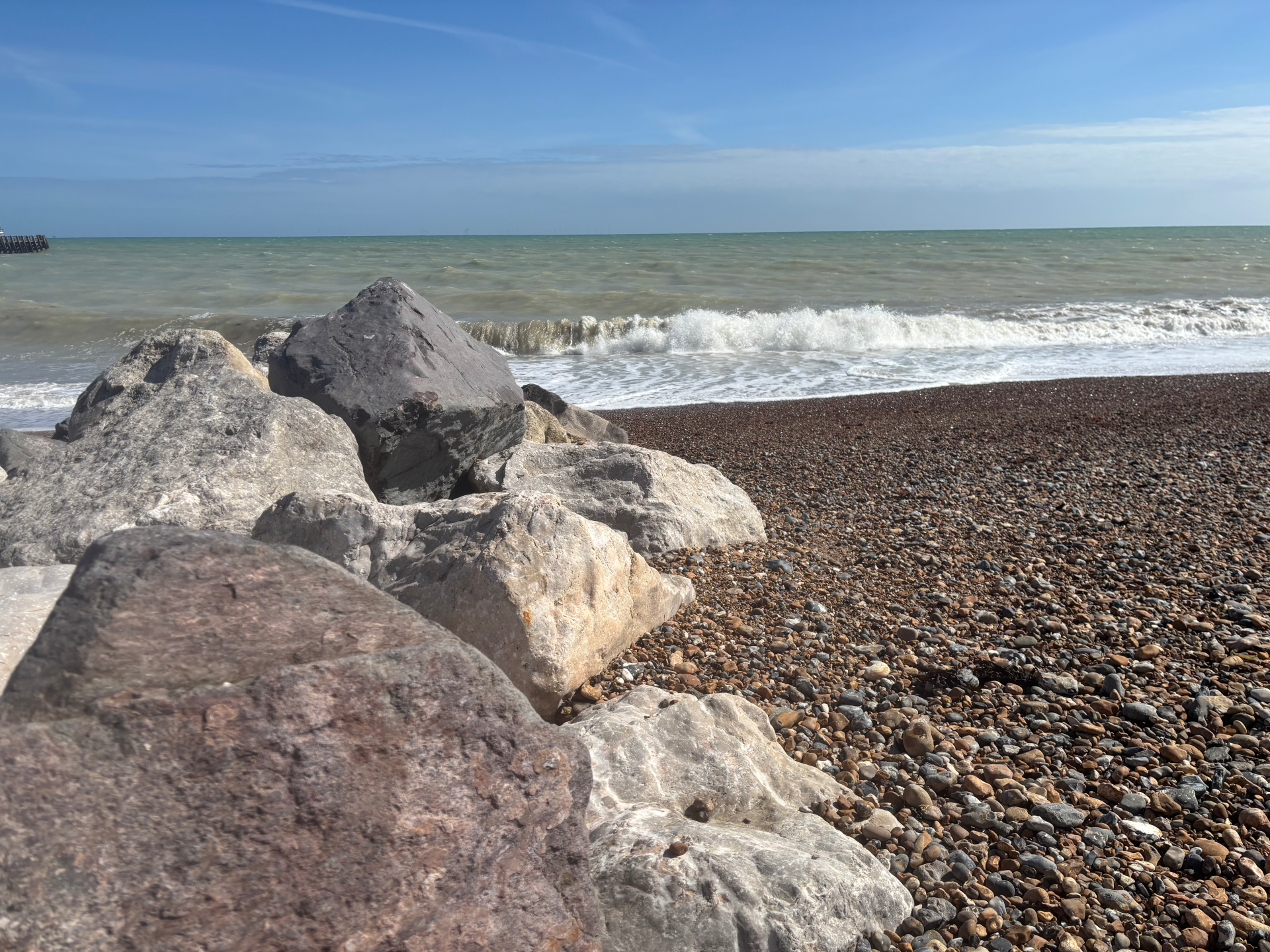 rocks and sea Waves crashing on rocks on Worthing beach